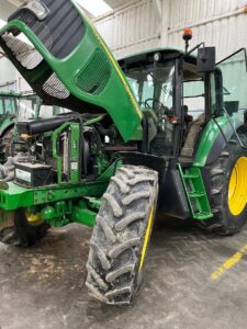 Quien Somos Taller tractor John Deere